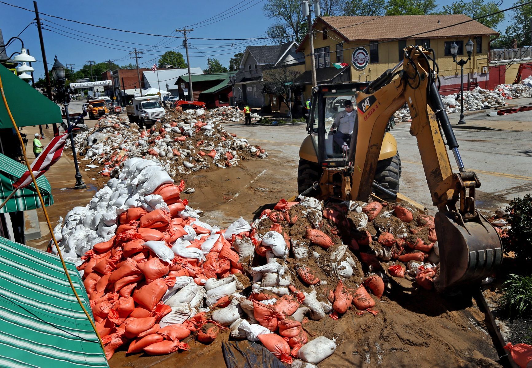 Sandbag levee wall coming down